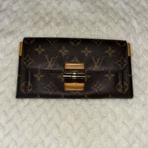 Vintage Louis Vuitton clutch wallet. Guaranteed authentic